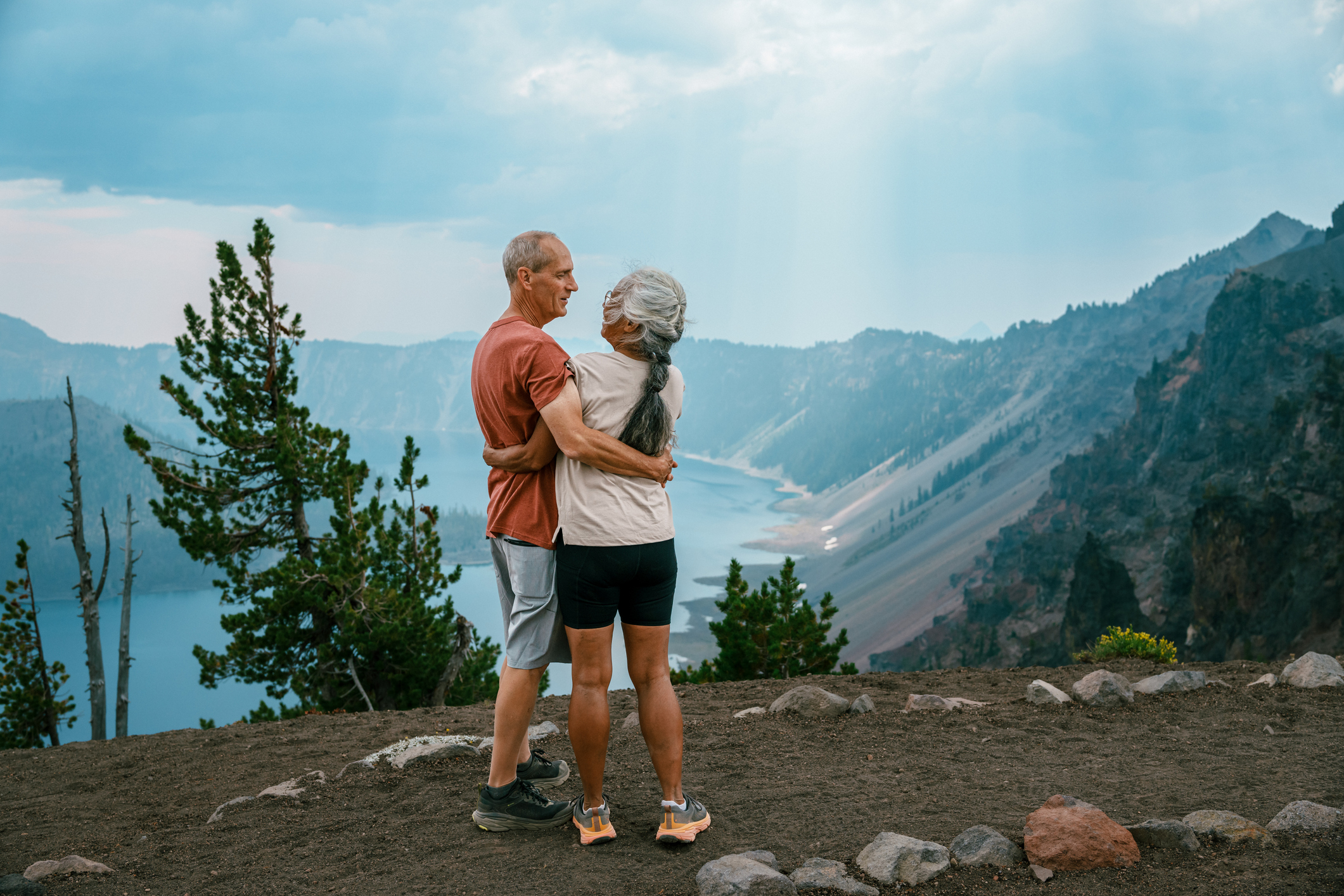 Active senior couple enjoying scenic view while on a hike Beatrice Bradley Couples